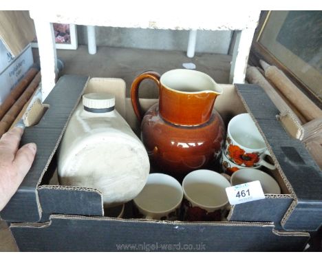 Box of salt glazed jug, hot water bottle, cups and saucers.
