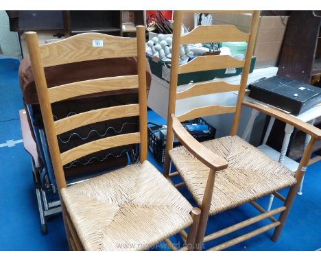 An Ash and other woods carver ladder back chair plus a similar side chair both with sea-grass seats.