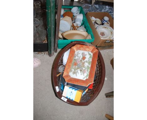 A basket and a box of miscellanea including mug tree, breakfast cups, wall plates, etc.,