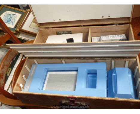 A wooden boxed screen printing kit.