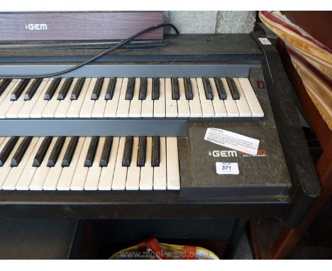 A GEM MK 10 electric Organ with two manual and foot keyboard plus Stool.