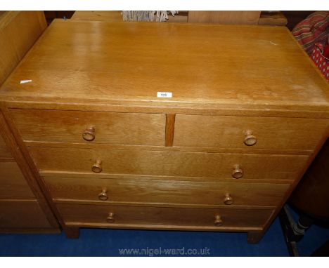 An ex-M.O.D. light Oak chest of three long and two short drawers, 2'9" high x 2'11" wide