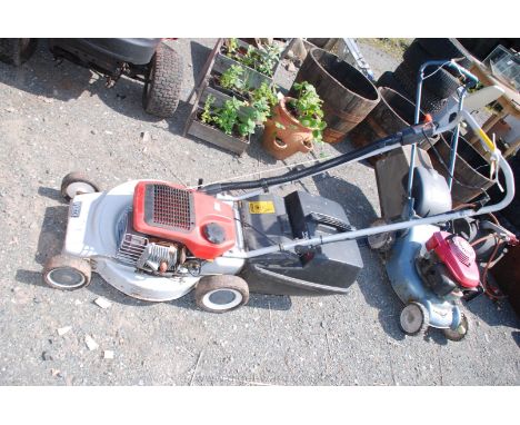 A Victa petrol engined rotary lawn-mower, in easy-starting running order.