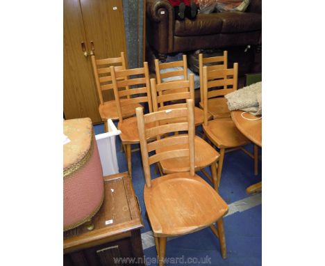 Seven sturdy Elm &amp; Beech ladder-back kitchen chairs.