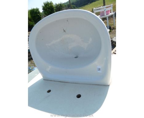 A wall-mounting wash hand basin.