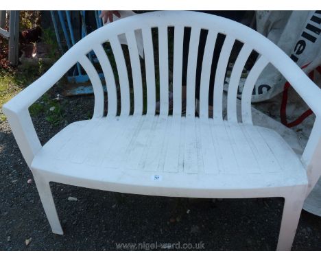 Plastic two seater bench.