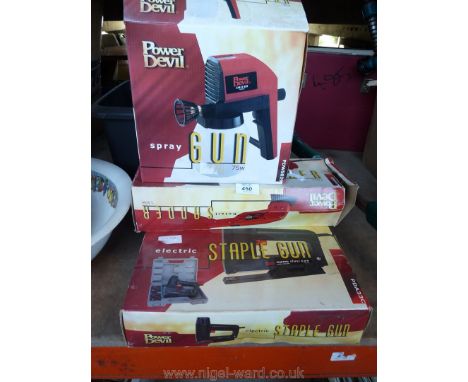 A power diesel spray gun, staple gun and sander.