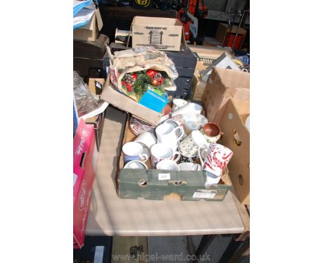 A box of miscellaneous mugs, Christmas wreath, Vaseline glass lamp-shade, etc.,