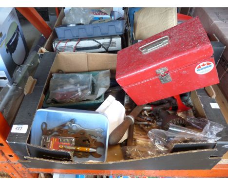 A box of miscellaneous tools in tool box.