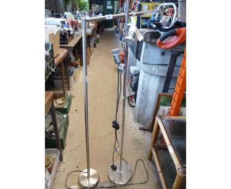 Two tall floor lamps, one with three LED lights, chrome circular base and upright, 5' 2" high and the other reading lamp with