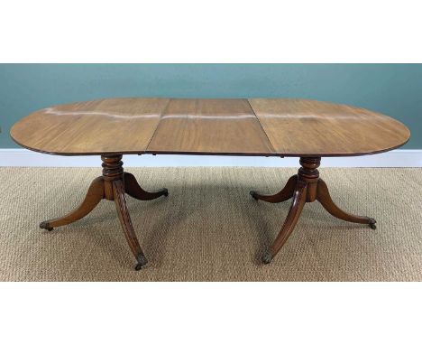 REGENCY-STYLE MAHOGANY TWIN PEDESTAL DINING TABLE, reeded edge above ring turned columns, above swept legs with caps and cast