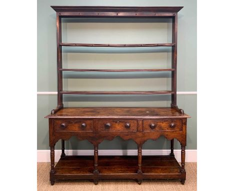 EARLY 19TH CENTURY WELSH OAK HIGH DRESSER, three shelf open rack above a pot board base, fitted three frieze drawers, on turn