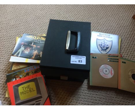 Records : Case of singles 1980's inc Kraftwerk, R. Stones, Black Sabbath etc in protective slvs all company sleeves also with