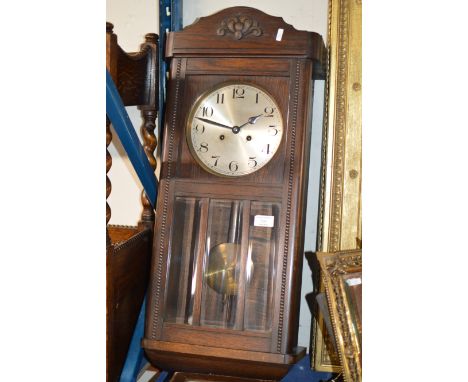 OAK CASED STRIKING WALL CLOCK     