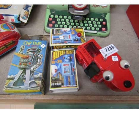 A boxed MTU Korea tinplate Captain The Robot, two boxed Masudaya Corp R-35 Antique Robots and a tinplate robot dog 