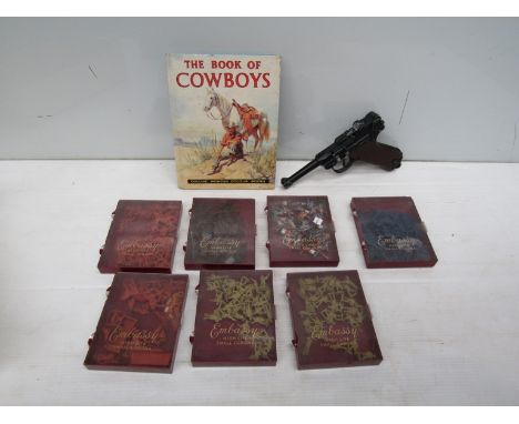 A Lone Star Luger cap gun, quantity of plastic figures and a Cowboy book