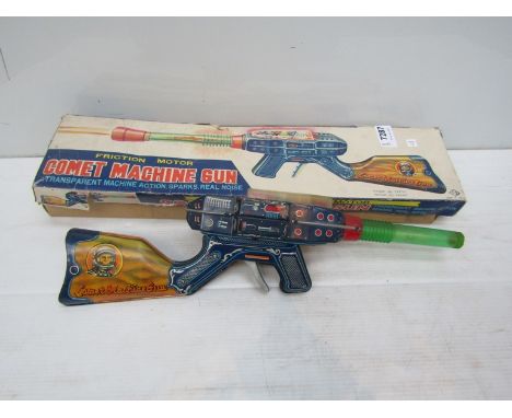 A boxed Japanese KO (Yoshiya) tinplate Comet Machine Gun 