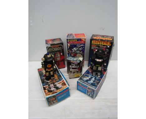 A collection of plastic and tinplate robots to include S.J.M Rotate-O-Matic Super Astronaut (boxed), Antenna Command Starry R