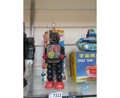 A boxed KO, Japan tinplate High-Wheel Robot 