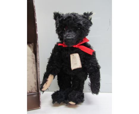 A part boxed Steiff replica 1912 black jointed bear, with certificate