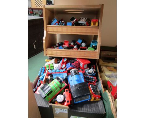 A collection of assorted Thomas the Tank Engine toys including ERTL and a Thomas the Tank Engine carry case