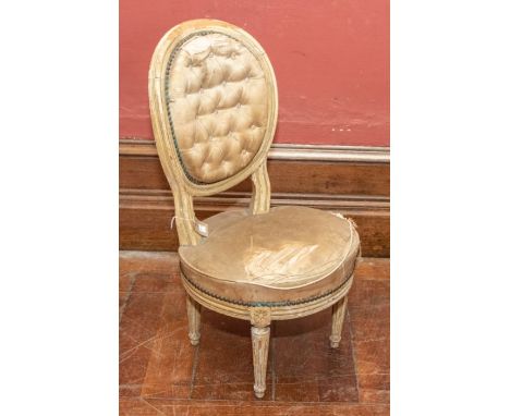 A 19th century French giltwood button back children's chair, circular back, upholstery in poor condition, circular seat, with