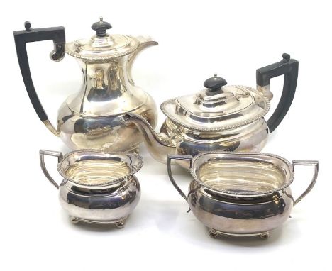 A mid 20th century Elizabeth II silver four-piece tea set, the teapot, sugar bowl and milk jug hallmarked Sheffield 1964 and 