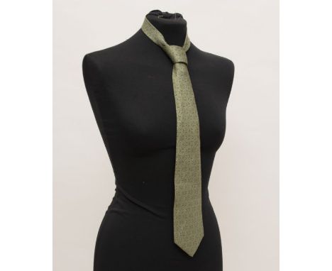 An Hermes silk tie, green unboxed
