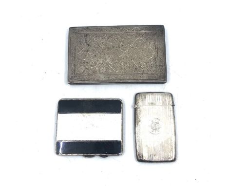 A silver greeting card case with engine turned decoration Birmingham 1916, a white metal cigarette case with engine turned en