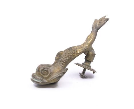 An early 20th century brass door knocker in the form of a fish 25cm long&nbsp;