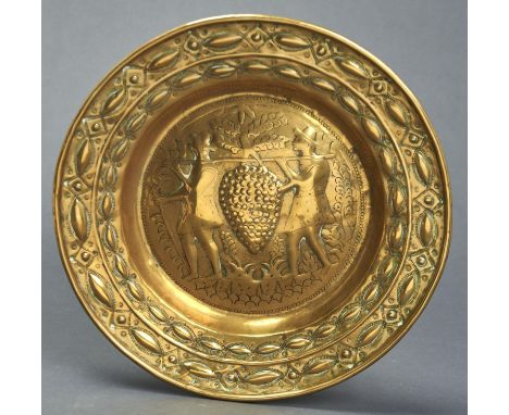 A NUREMBERG BRASS ARMS DISH, 17TH / 18TH C, EMBOSSED TO THE CENTRE WITH WINE MAKERS, 40.5CM DIAM Wear and polish residues; ev