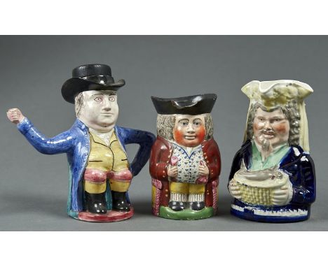 A BRITISH EARTHENWARE JUG-AND-GLASS TOBY JUG, C1840, 17CM H, A LATER 19TH C TOBY JUG AND A TEAPOT (3) First jug - tricorn dam
