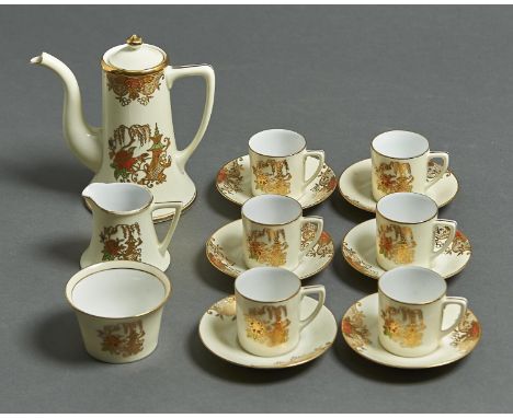 A NORITAKE COFFEE SERVICE, MID 20TH C, WITH RED, GREEN, BLUE AND RAISED GILT PAGODA AND FLOWER DECORATION, COFFEE POT AND COV