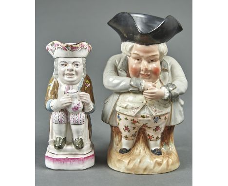 A CONTINENTAL POTTERY SNUFF TAKER TOBY JUG AND A SMALLER FRENCH FAIENCE TOBY JUG, LATE 19TH / EARLY 20TH C, AFTER ENGLISH 18T
