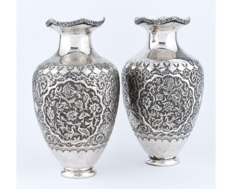 A PAIR OF OTTOMAN SILVER SHOULDERED OVIFORM REPOUSSE VASES, ARMENIA, LATE 19TH C, THE SHAPED NECK WITH APPLIED FOLIATE CHASED