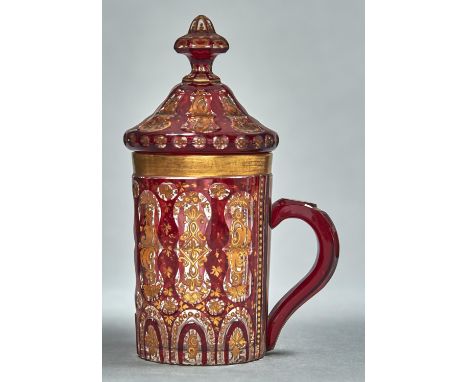 A BOHEMIAN RUBY FLASHED AND ENAMELLED GLASS MUG AND COVER, POSSIBLY MADE FOR THE OTTOMAN MARKET,&nbsp; C1850, ENAMELLED IN AP