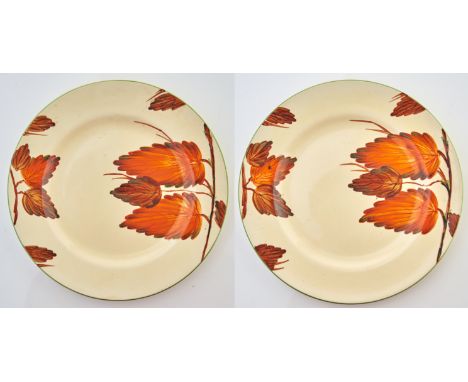 CLARICE CLIFF. A PAIR OF A J WILKINSON CHESTNUT LEAVES PLATES, C1930, 25.5CM DIAM, PRINTED HONEYGLAZE MARK, PATTERN 8927 Good