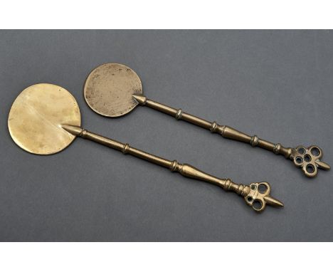 TWO ENGLISH BELL METAL SALAMANDERS, 18TH / 19TH C, WITH RINGED BALUSTER SHAFT AND PIERCED TERMINAL, 34 AND 37CM L Light wear 