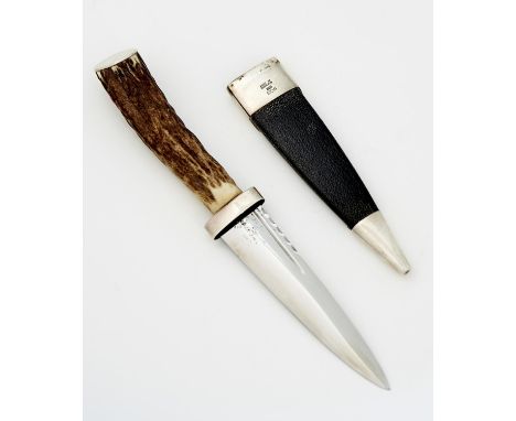 A SGIAN DHU AND SILVER MOUNTED LEATHER SHEATH, 21.5CM OVERALL, BY THOMAS KERR EBBUTT LTD, EDINBURGH 1961 As new