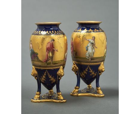 A PAIR OF VIENNA STYLE COBALT GROUND OVOID VASES, EARLY 20TH C, PAINTED WITH CLASSICAL FIGURES ON A GILT BAND ABOVE RAISED GI