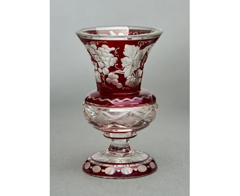 A CUT AND RUBY FLASHED GLASS THISTLE SHAPED VASE, MID 19TH C, THE FLARED BOWL ENGRAVED WITH GRAPEVINES, THE UNDERSIDE OF THE 