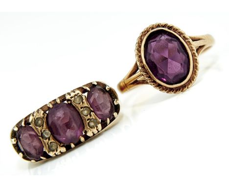 TWO AMETHYST RINGS,&nbsp; IN 9CT GOLD, 7G SIZES,&nbsp; M½ AND Q. Light wear including the facets of the amethysts and 3 stone