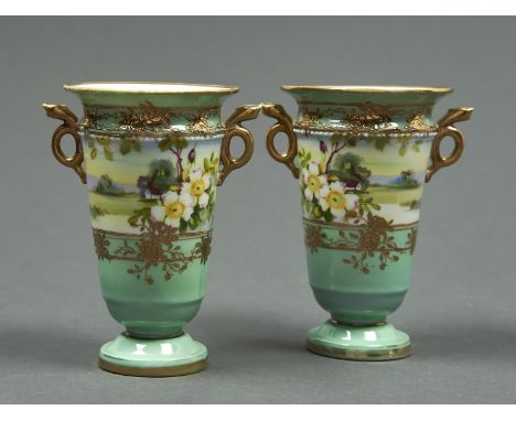 A PAIR OF NORITAKE SNAKE HANDLED VASES, EARLY 20TH C, THE SHAPE DERIVED FROM AN EARLIER WORCESTER MODEL, PAINTED WITH A CONTI