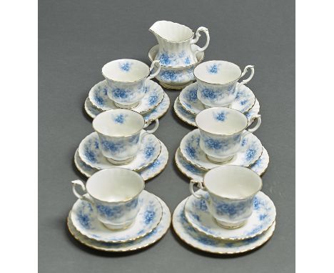 A ROYAL ALBERT WINDSOR ROSE PATTERN TEA SERVICE, COMPRISING SIX CUPS, SIX SAUCERS, SIX TEA PLATES, SUGAR BOWL AND CREAM JUG, 