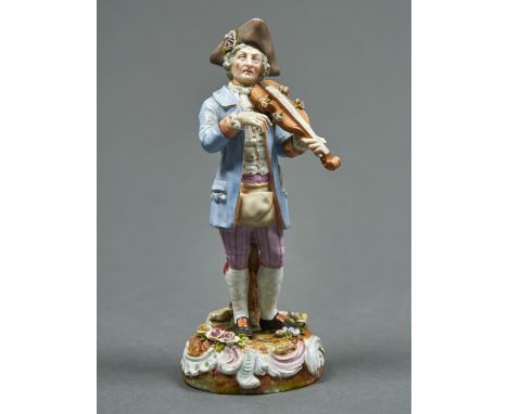 A GERMAN PORCELAIN FIGURE OF A MUSICIAN, LATE 19TH C, PLAYING THE VIOLIN AND DRESSED IN A LIGHT BLUE COAT, PUCE BREECHES AND 
