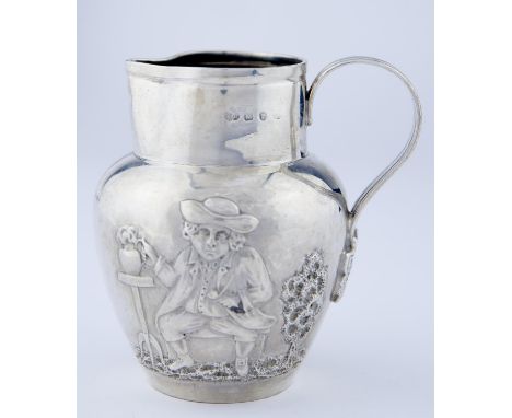 A VICTORIAN SILVER DUTCH&nbsp; JUG, EMBOSSED TO EITHER SIDE WITH TOPERS,&nbsp; THE REEDED HANDLE TERMINATING IN LEAVES, 11.5C