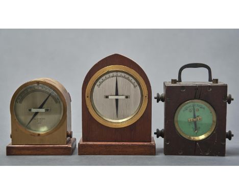 A LANCET ARCHED MAHOGANY CASED GALVANOMETER, ANOTHER IN LACQUERED BRASS CASE, DIAL MARKED SILVERTOWN, NO 729, 1915, STAMPED G