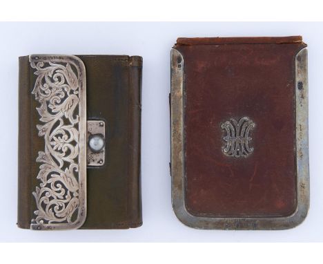 A VICTORIAN SILVER MOUNTED LEATHER WALLET, APPLIED WITH A SILVER MONOGRAM, 8 X 11.5CM, BY JAMES BROS, LONDON, PROBABLY 1866 A