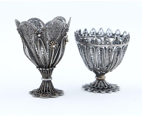 TWO OTTOMAN SILVER FILIGREE ZARFS, LATE 19TH C, ONE WITH TRACES OF GILDING, 47 AND 60MM H, 2OZS One or two tiny dents but no 