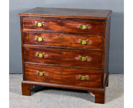 A George III Figured Mahogany Chest, with moulded edge to top, fitted four long graduated drawers, on bracket feet, 33ins wid